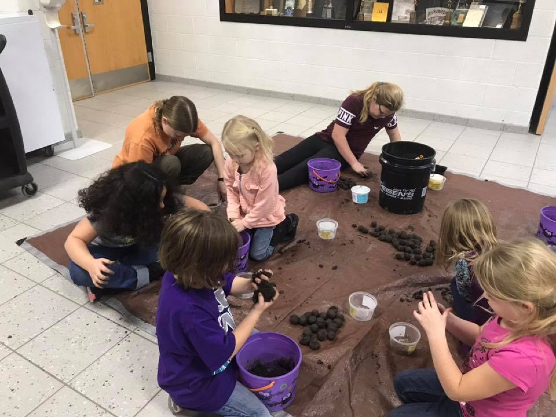 Children taking part in an activity with Cedar County Conservation